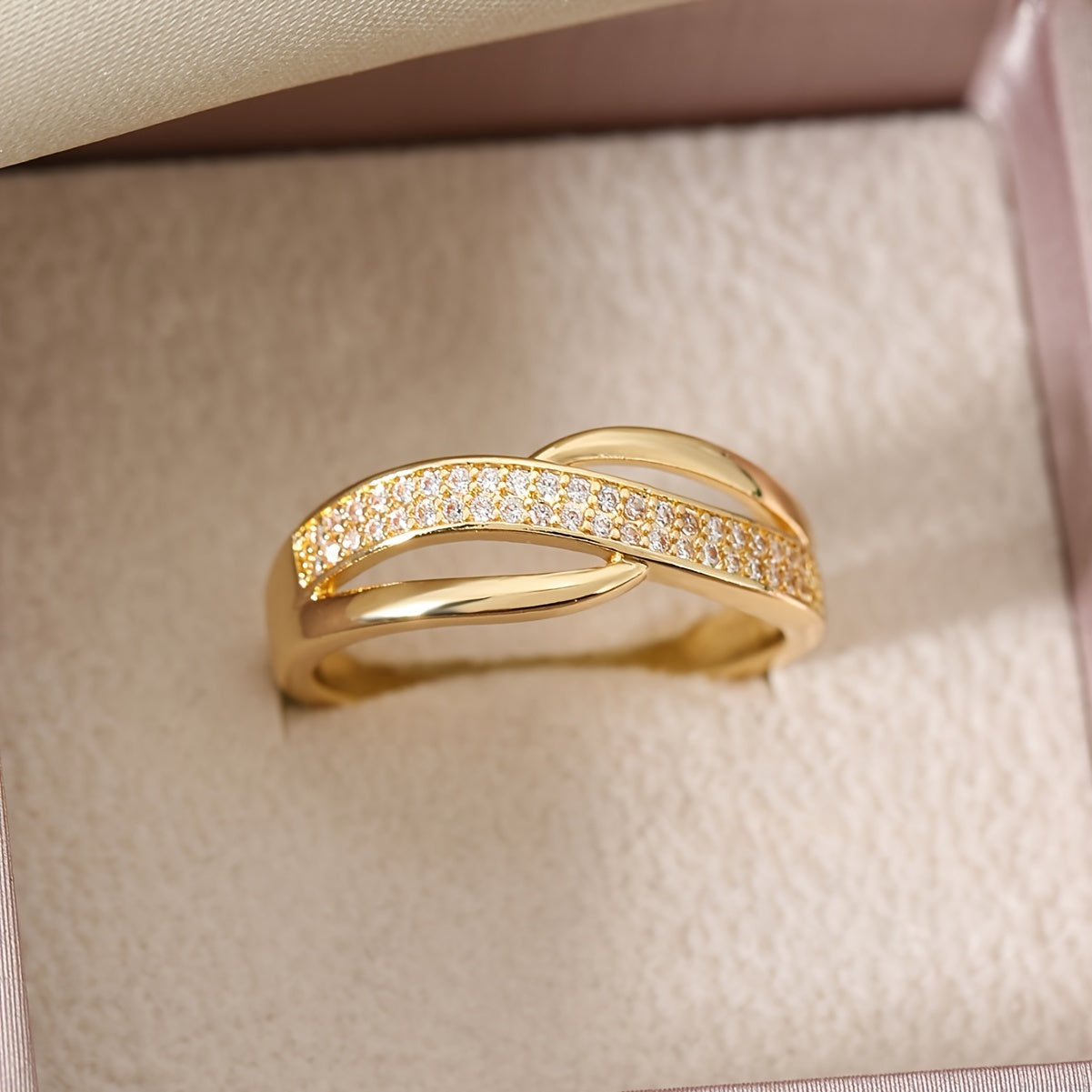 Elegant Gold-Coloured Crossover Ring with Stones