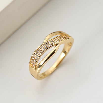 Elegant Gold-Coloured Crossover Ring with Stones